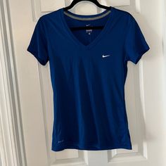 V Neck White Nike Symbol Dry Fit Thin And Airy Nike Azul, Nike Symbol, Tops Nike, Nike Swim, Swim Shirts, White Nike, Future Fashion, Blue Nike, Nike Outfits