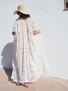 Very cool vintage crochet oversized long waitcoat handmade cotton crochet up-cycled by Vagabond Ibiza We hand source antique and vintage crochet & lace textiles and up-cycle it here in Ibiza in to unique on off a kind garment just for you. Due to the nature there could be some imperfections but we do our best to only recycle mint condition textiles. Size is free size Condition is perfect Oversized Cream Bohemian Poncho, Luxury Long Bohemian Cover-up, White Oversized Bohemian Cardigan, Luxury White Bohemian Crochet Dress, White Bohemian Crochet Lace Cover-up, Clothing Exchange, Long Waistcoat, Padded Hangers, Metal Hangers