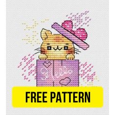 a cross stitch pattern with a cat sitting on top of a box and the text free pattern