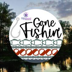 there is a sign that says gone fishing in front of some trees and water with the words gone fishing on it