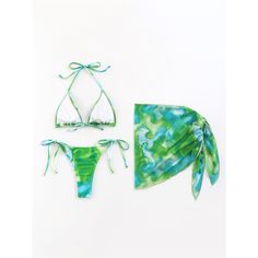 Features: Get ready for a stylish and functional swimsuit with our Sarong Printed Halter Strappy Bikini! This three-piece set features a halter top and strappy bottoms for a secure fit and adjustable coverage. The sarong design adds a unique touch while providing additional coverage. Perfect for any beach or pool day!