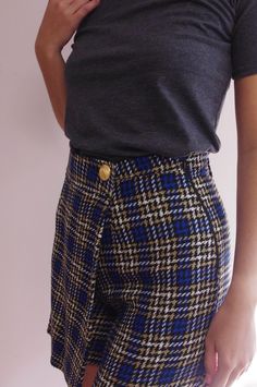 Add a touch of timeless elegance to your wardrobe with this tartan-patterned wool skort, handmade in my atelier. Crafted from fabrics sourced from the dormant stocks of fashion houses, this unique, eco-responsible piece is perfect for the fall and winter seasons. The blue and brown tartan pattern offers a classic yet modern look, while the high-waisted cut flatters the figure and elongates the legs. The practical integrated short detail ensures comfort and freedom of movement, while retaining th Brown Tartan, Artisan Fashion, Jupe Short, Womens Skirts, Blue And Brown, Tartan Pattern, Fashion Seasons, Fall Looks, The Chic