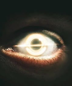 an eye with light coming out of it