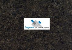 the logo for sognore tile and sinks co on a black granite countertop