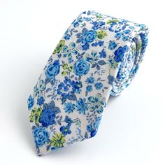 This Handcrafted Necktie Is Perfect For A Spring/Summer Wedding Or Party, Or Even Just A Day Out In The Sun! Fabric: 100% Cotton Style: Slim/Narrow Measurements: Approx. W 2.4” X L 57” Care: Dry Clean Only *Buy 2 Ties At Regular Price And Get A Tie Of Equal Or Lesser Value For Free! Please Feel Free To Contact Me For Details About This Deal. Thank You! Summer Wedding Cotton Ties, White Cotton Ties For Summer, Blue Summer Tie, White Floral Print Ties For Summer, White Cotton Summer Ties, Summer Floral Print White Ties, Summer White Floral Print Ties, Classic Floral Print Ties For Summer, Classic Floral Print Summer Tie