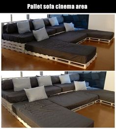 the couch is made out of pallets and has pillows on it