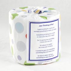 a roll of toilet paper with polka dots on it and a poem written in the center