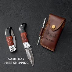 two knives and a wallet sitting on top of a black surface with the words same day free shipping