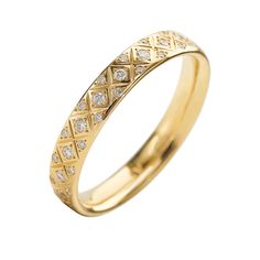 a yellow gold ring with diamonds on it