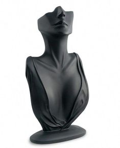 a black mannequin head is shown on a white background, with the top half draped over