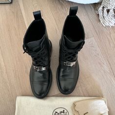 100% Authentic Black Hermes Funk Boot Size 5 With Silver Hardware. Purchased These Hermes Ankle Boots August 2023 And Wore Them Probably 3-4 Times. The Sticker Is Still On The Buckle. The Boot Comes In Dust Bag And Extra Shoe Laces. I Also Have A Picture Of The Receipt. I Can Find An Hermes Box To Put The Boot In. Hermes Shoes, Hermes Box, Silver Hardware, Shoe Laces, Bootie Boots, Ankle Boot, Dust Bag, Ankle Boots, Buckle