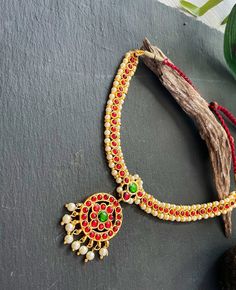 This Unique set of jewellery is designed and crafted at PraNiCollectioNs  PraNiCollectioNs is the place for anyone who Is in lookout for a latest trend with an ethnic touch.  We at PraNiCollectioNs offers a great range of Indian Ethnic jewellery's. We are strongly committed to  Providing our customers  some uniquely handcrafted Products with utmost satisfaction. This jewellery set is made from high quality material which are Hypoallergenic and are also free from corrosion and rusting.  This neck Ruby Choker Necklace, Temple Jewellery Set, Ruby Choker, Kemp Necklace, Indian Jewelry Set, Jewellery Bridal, Bridal Necklace Set, South Indian Jewelry, Indian Jewelry Sets