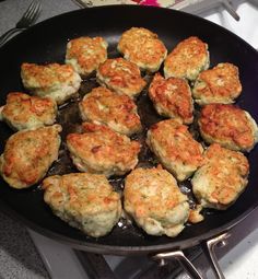 some food is being cooked in a pan on the stove top and ready to be eaten