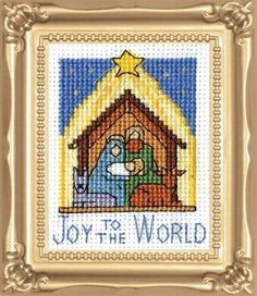 a cross stitch christmas card with the words joy to the world in blue and gold