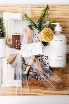 a wooden table topped with lots of personal care items