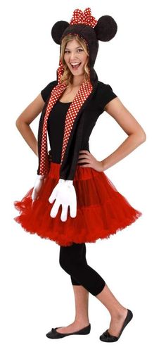 a woman in minnie mouse costume posing for the camera