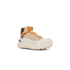 Moncler Ladies Sneakers. SKU: H209B4M00240-M2437-P19. Color: BeigeMoncler Ladies Trailgrip GTX Nubuck High-Top Sneakers. The Trailgrip sneakers, crafted from nubuck with a water-repellent membrane, feature a lace-up design, TPU spoiler, EVA midsole for flexibility and lightness, carbon fiber between the midsole and tread, and a special Vibram Megagrip rubber compound treaded sole with a 4.5 cm height, offering comfort, protection, stability, and slip resistance for outdoor activities. Please visit the brand website for sizing information. Ladies Sneakers, Brand Website, Website Branding, High Top, Water Repellent, Repellent, Carbon Fiber, Outdoor Activities, Top Sneakers