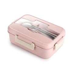 a pink lunch box with utensils in it