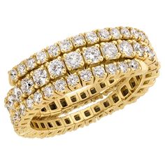 Introducing our exquisite Flexible Diamond Wrap Ring, a true marvel of beauty and craftsmanship. Crafted with utmost precision, this stunning piece features a total carat weight of 1.60, boasting 73 brilliant round diamonds that radiate brilliance and elegance. The ring is crafted from 18kt Yellow Gold, a luxurious and timeless metal that adds warmth and sophistication to the design. Its rich hue complements the diamonds, creating a harmonious blend of luxury and sparkle. The diamonds chosen for Luxury Yellow Cubic Zirconia Jewelry, Star-shaped Yellow Gold Cubic Zirconia Jewelry, Luxury Yellow Jewelry With Sparkling Stones, Luxury Yellow Cubic Zirconia Earrings, Diamond Wrap Ring, Luxury Yellow Gold Diamond Bracelet, Tarnish Resistant, Diamond Color Grade, Wrap Ring, Wrap Rings