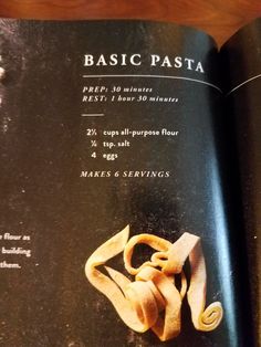 an open book with instructions on how to make pasta