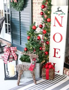 a christmas porch decorated for the holidays