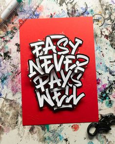 a piece of paper with the words easy never have fun written on it next to scissors