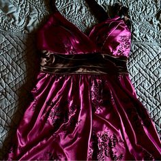 Nwot Trixxi Size M Medium 100% Polyester Material Looks Like A Reddish Purple (Took Photos In Different Lights) And Has A Black Velvet Flower Print. Cross Over V Neck Empire Waist And Neck Have Black Sash Ties Side Zipper Measurements Are Taken Laid Flat And Are Approximate Armpit To Armpit 16.25” Length From Top Of Bodice 30” Length From Empire Waist 22” Gathered “Bubble” Type Hem Bin4 Black Velvet Flower, Bubble Type, 2000s Fashion Inspiration, 2000 Clothes, Black Sash, Velvet Flower, 2000s Style, Reddish Purple, Trixxi Dress