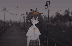 a girl standing in the middle of an empty road with leaves falling from her hair