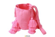 Medium soft pink Wayuu Mochila Bag with 4 Tassels - Crossbody Size : 23cm Height (Medium) Strap : 100cm (crossbody & Shoulder) - ⭐️Shipping: DHL : * USA, Central & North America: 2-3 Business Days * Rest of The World: 4-6 Business Days - ⭐️ Best of Colombia is the House to More Than 300 Artesans From all Around Colombia. Your Support Means Alot To Us & To Them. - If you Have Any Question or Wish To Acquiere Our Products Wholesale ; Please Feel Free To Reach Us At AnyTime Either On Et Rectangular Pink Bag With Fringe, Pink Rectangular Tassel Bag, Pink Fringe Shoulder Bag, Pink Tassel Bag For Travel, Pink Bags With Tassels For Daily Use, Pink Fringe Bag For Daily Use, Pink Fringe Bag For Everyday Use, Pink Fringe Bag, Mochila Bag