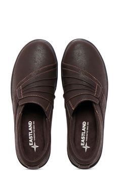 Faux leather crafts a slip-on loafer with dual-side elastic for easy on and off with a customized fit and grippy soles for comfort in every stride. 1.45" heel Slip-on style Memory foam insole Synthetic upper and TPR sole Imported Brown Synthetic Slip-ons With Rubber Sole, Synthetic Slip-ons With Leather Sole, Brown Slip-ons With Ortholite Insole, Fall Slip-on Loafers With Ortholite Insole, Brown Slip-ons With Branded Insole, Slip-on Synthetic Slip-resistant Loafers, Fall Slip-on Walking Shoes With Rubber Sole, Slip-resistant Slip-on Synthetic Loafers, Brown Closed Toe Slip-ons