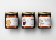 three jars of cookies and honey on a white background with the label design is ginger spice