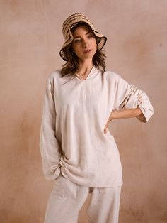 Our unisex loungewear sets are made from the finest imported Egyptian cotton and linen. Once the yarn arrives in Casablanca, it is transported to small villages around the town of Essaouira in southern Morocco. There, our in-house collaborative team of weavers, designers, and seamstresses produce our beautiful garments. Features: Loom woven Egyptian tissue Material content: 100% Linen Machine washable: delicate/cold water Relaxed Fit Long Sleeve Sleepwear For Leisure, Cream Linen Tops For Loungewear, Cream Linen Loungewear Tops, Long Sleeve Linen Sleepwear For Relaxation, Relaxed Fit Linen Tops For Relaxation, Relaxed Linen Top For Relaxation, Casual Linen Sleepwear For Relaxation, Linen Long Sleeve Sleepwear For Lounging, Casual Linen Sleepwear Relaxed Fit