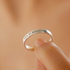 A meaningful gift for your friend, sister, mother, friend, bridesmaid, loved one or a special treat just for yourself. This affordable and thoughtful gift will surely be treasured by your loved one.This customized name ring can be engraved however you desire. Type your roman numeral, names, initials, your special date or inspirational words to design your necklace, make you unique and show off your personality.• Completely handmade items.• Various ring materials; from sterling silver to rose gol Minimalist Engraved Stackable Promise Ring, Minimalist Initial Ring For Mother's Day, Simple Personalized Adjustable Rings, Simple Adjustable Personalized Rings, Simple Adjustable Personalized Ring, Dainty Custom Name Ring For Gift, Dainty Rings With Custom Name For Gift, Dainty Custom Name Rings For Gifts, Personalized Dainty Engraved Ring For Promise