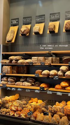 an assortment of breads and pastries on display