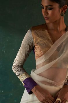 From festive to wedding, our gota sari that makes you stand out from the rest, paired with a multi tissue patchwork long sleeve blouse that adds a touch of glamour. This contemporary sari has the feel of the old world charm that is perfectly blending with the modern style. Gold tissue blazer over it not only gives a fusion contemporary touch but also keeps you warm yet glam. Blazer Set, Old World Charm, Over It, Old World, Blending, The Old, Modern Style, The Modern, Sleeve Blouse