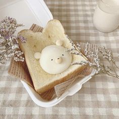 a piece of bread with a bear face on it