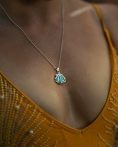 Wonderful seashell pendant will be an amazing addition to your look, You can wear it to the beach, party or to the meeting with your friends. It was made from silver and larimar and it is a very good quality pendant. Jewelry TypePendant Total Weight5.04 g Length26.50 mm Width19.72 mm Height4.76 mm Total Stone Weight3.3 ct Metal TypeSterling Silver Main StoneLarimar Main Stone Quantity4 Main Stone Weight3.3 ct Main Stone Length11.95 mm Main Stone Width3.50 mm Sterling Silver Pendant Jewelry For Beach, Shell-shaped Sterling Silver Jewelry For Beach, Ocean-inspired Sterling Silver Beach Jewelry, Silver Shell Pendant For Beach, Silver Beach Pendant Shell, Silver Shell-shaped Ocean-inspired Jewelry, Sterling Silver Shell As Gift, Ocean-inspired Turquoise Shell Jewelry, Sterling Silver Shell Necklace For Beach