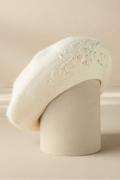 Our Pearl Embellished Floral Beret features a captivating floral and botanical design encircling its brim, creating an exquisite nature-inspired tapestry. What truly sets this beret apart is the intricate pearl embellishments sewn into the motifs, adding a radiant touch. Crafted from luxurious fabric, it offers unparalleled softness, insulation, and a lightweight, breathable feel. A statement piece that enhances any outfit with sophistication and femininity, this beret is perfect for both casual cafe outings and enjoying everyday moments.

Material: 70% Acrylic, 30% Rabbit Hair Elegant Embroidered Adjustable Hat, Elegant Adjustable Winter Beret, Embellished Beret, Weddings By Color, Women's Spurs, Botanical Design, Scarf Sale, Cloche Hat, Soft Surroundings