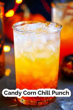 an orange and yellow drink in a glass with the words candy corn chill punch on it