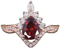 Luxury Red Pear-shaped Ring, Red Marquise Brilliant Cut Ring, Luxury Pear-shaped Ruby Wedding Ring, Elegant Red Marquise Cut Diamond Ring, Red Ruby Ring With Halo Design In Cubic Zirconia, Red Cubic Zirconia Ring With Halo Design, Red Halo Diamond Ring For Promise, Red Brilliant Cut Halo Ring For Wedding, Elegant Red Marquise Cut Ring