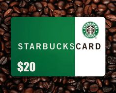 starbucks gift card sitting on top of coffee beans with the starbucks $ 20 sign over it