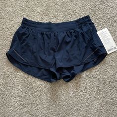 Lululemon Hotty Hot Shorts Navy 2.5” Inseam Low Rise Lined Running Nwt Pet Free Smoke Free Home. Lululemon Shorts 2.5, Navy Lululemon Shorts Outfit, Lululemon Shorts Collection, Navy Blue Lululemon Shorts, Lulu Lemon Hotty Hot Shorts, Hotty Hot Shorts Lululemon, Lululemon Shorts Outfit, Athletic Outfit Summer, Running Shorts Outfit