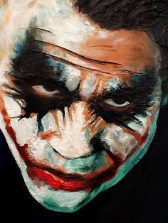 a painting of the joker with his face painted