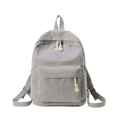 The Classic Corduroy Backpack has a roomy main compartment and easily accessible front + side pockets. The main compartment closes via two zippers with easy to open and close pull tabs. The interior is lined with fabric and the main compartment has an extra pocket inside. The backpack has a top handle and adjustable back straps. Size:- Length: 11" (28cm)- Width: 4.7" (12cm)- Height: 15.7" (40cm) Material: corduroy & polyester Soft School, Handbags For School, Simple Backpack, Backpack For Teens, Bags For Teens, Student Bag, Girls Stripes, School Backpack, Girl Backpacks