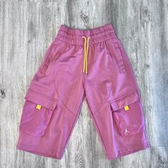 New With Tags. Never Worn. Nike Pink Bottoms With Pockets, Pink Nike Bottoms With Pockets, Nike Bottoms With Pockets Short Length, Casual Pink Pants With Built-in Shorts, Nike Casual Pink Bottoms, Nike Casual Short Pants, Nike Athleisure Pants For Summer, Nike Summer Athleisure Pants, Nike Cotton Pants For Summer