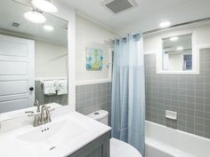 the bathroom is clean and ready to be used as a guest room or office space