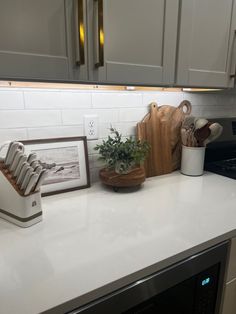 the kitchen counter is clean and ready to be used as a place for cutting vegetables