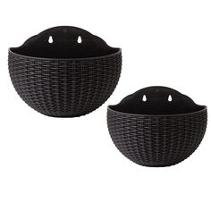 two black baskets sitting next to each other