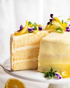 there is a piece of cake on the plate and one slice has been cut from it