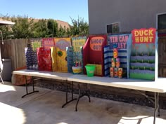 a long table with many colorful bags on it